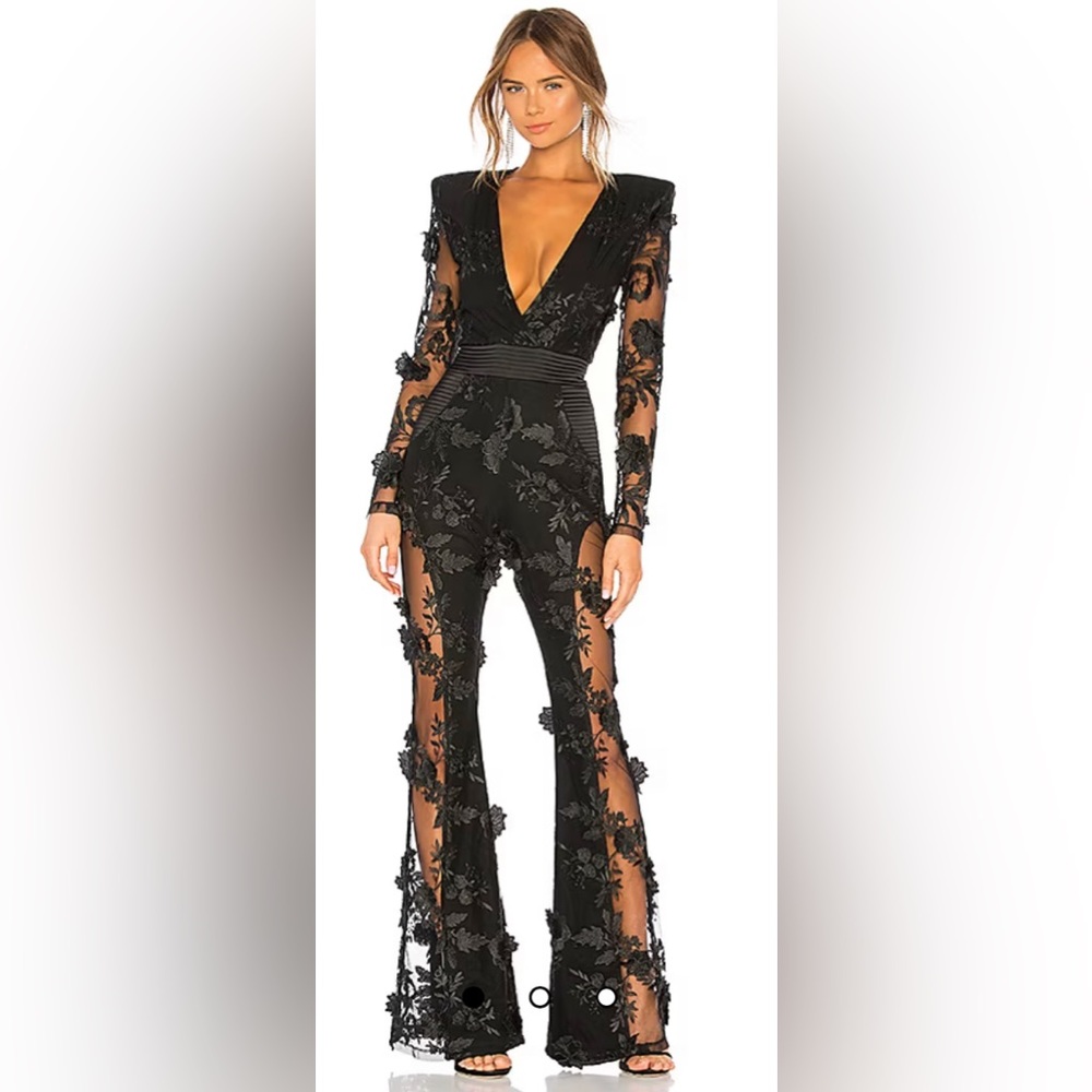 Gorgeous ZHIVAGO BLACK JUMPSUIT SIZE 4 US. Never worn